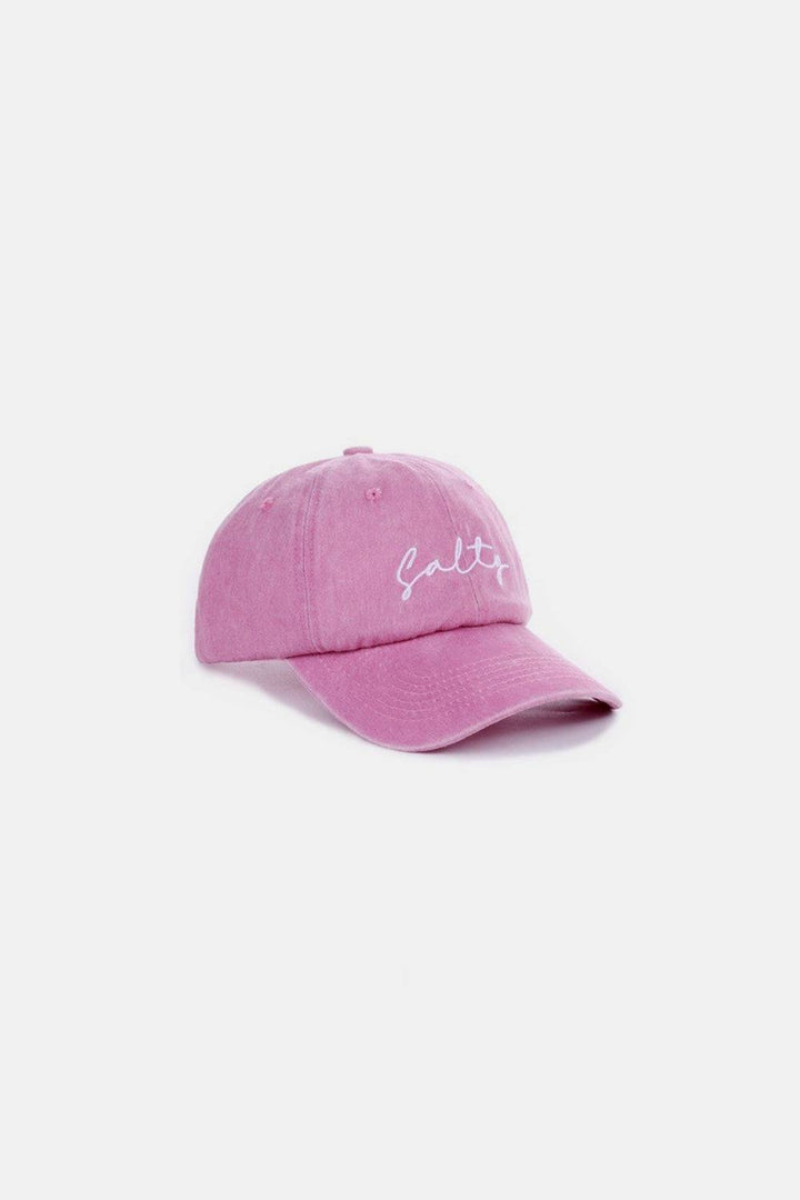 a pink hat with a white logo on it
