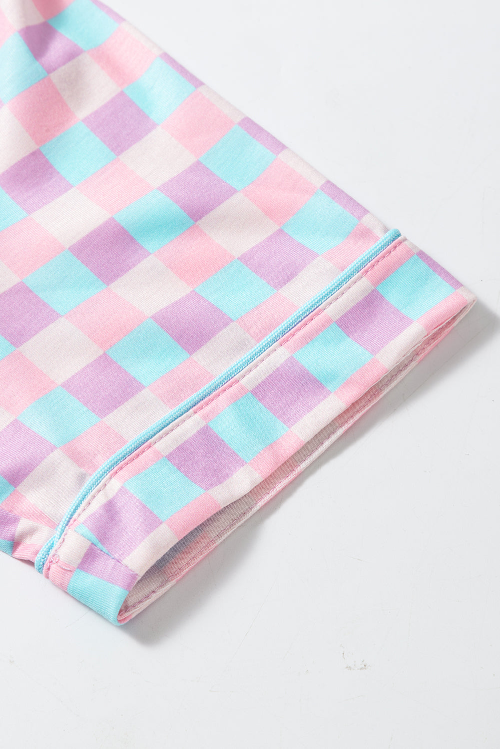 Sleeve detail of Purple Checkered Pattern Short Sleeve Pajamas Set showing pastel checkered print and clean seam finish.