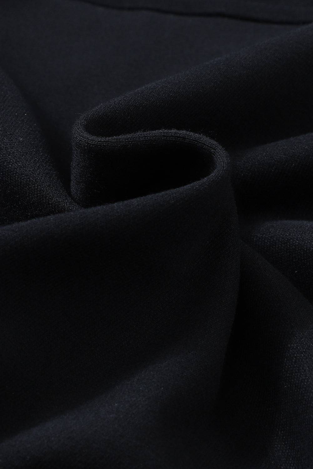 a close up view of a black fabric