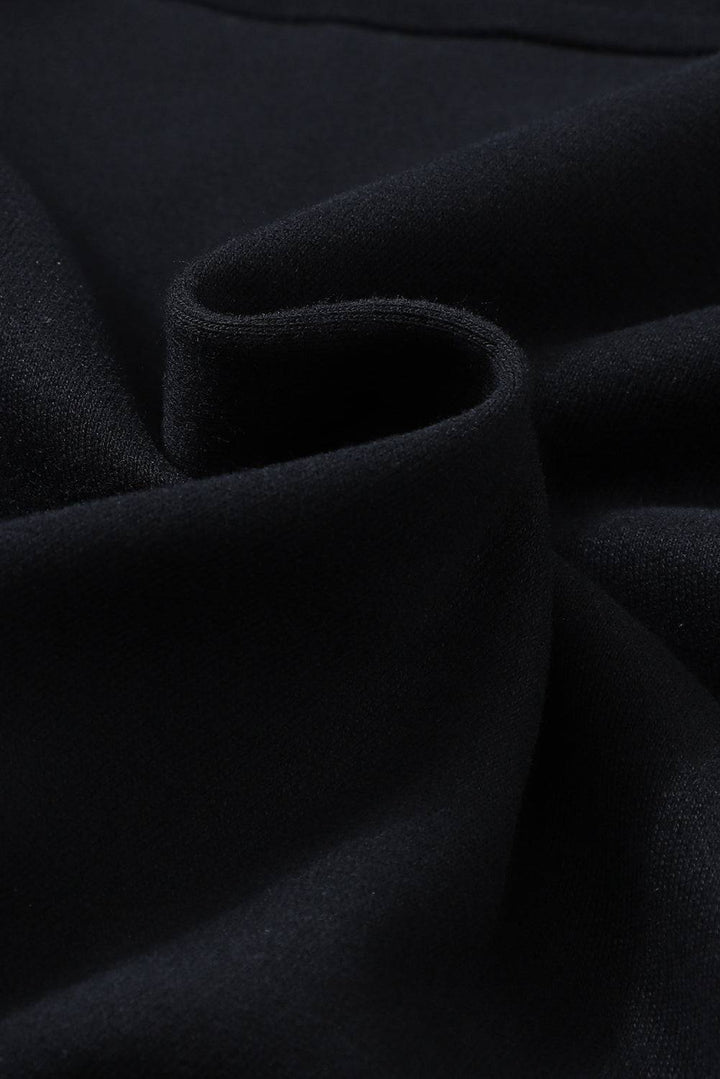 a close up view of a black fabric