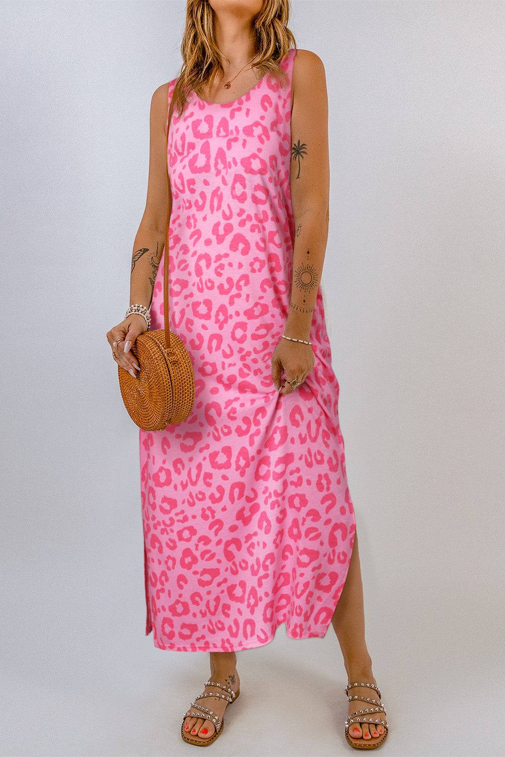 a woman in a pink leopard print dress