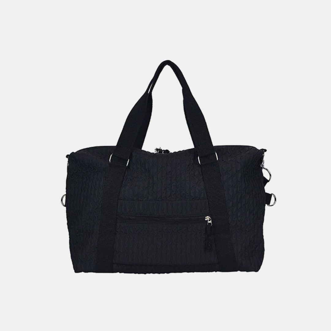 a black tote bag with zippers and handles