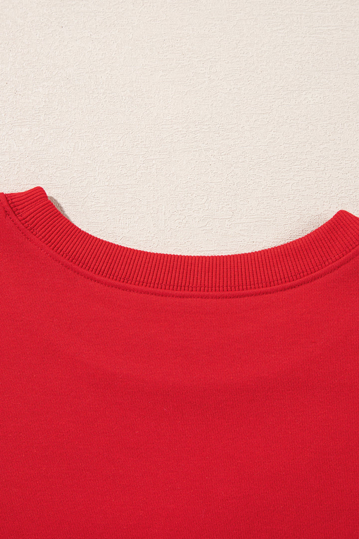 Back neckline close-up of Red Merry Christmas Crewneck Drop Shoulder Loose Sweatshirt, showing smooth fabric and stitching, shop at Faith & Co. Boutique.