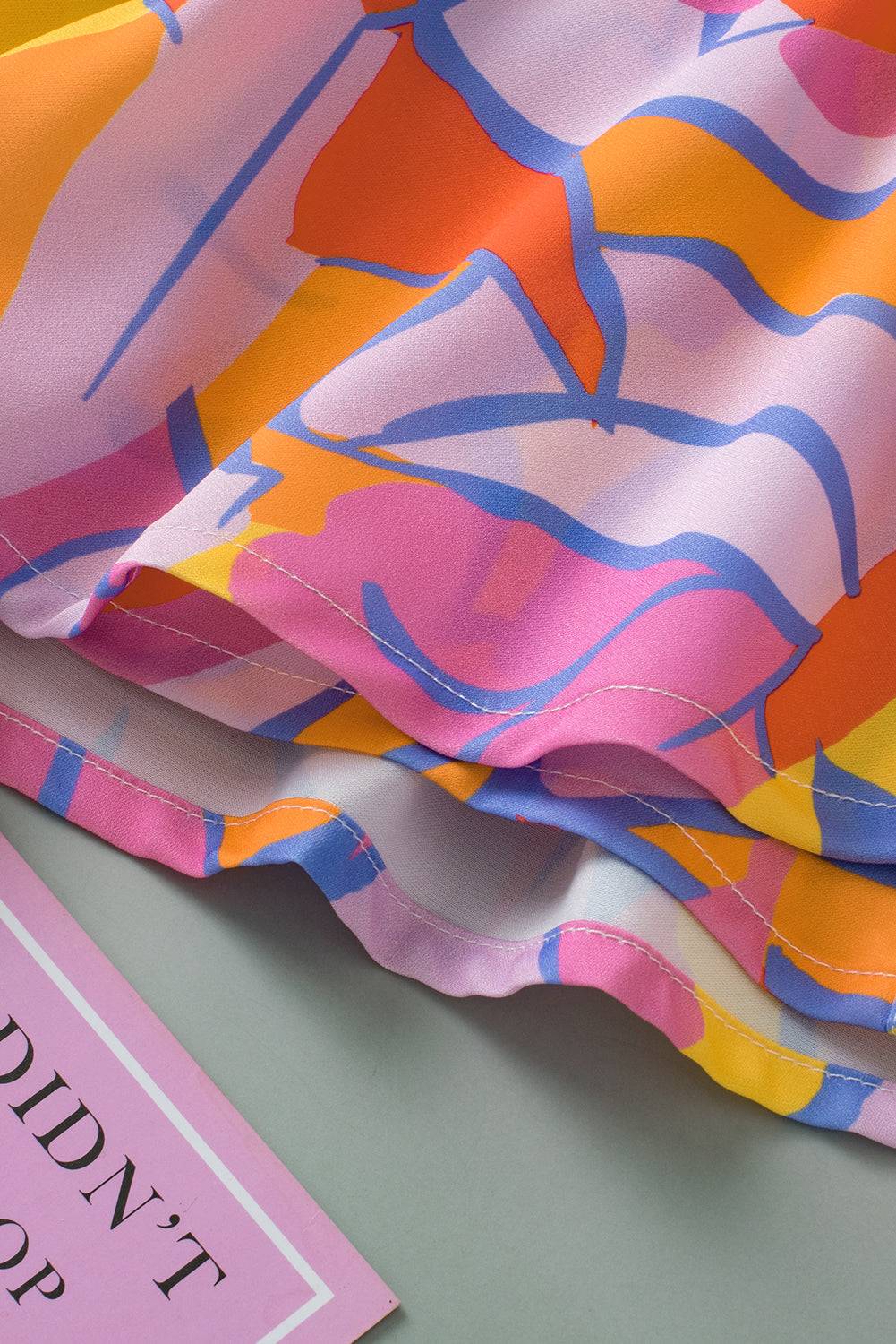 a close up of a colorful dress on a table