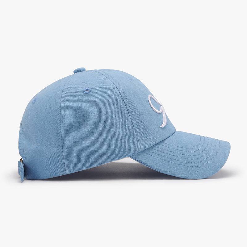 a light blue hat with a white logo on it