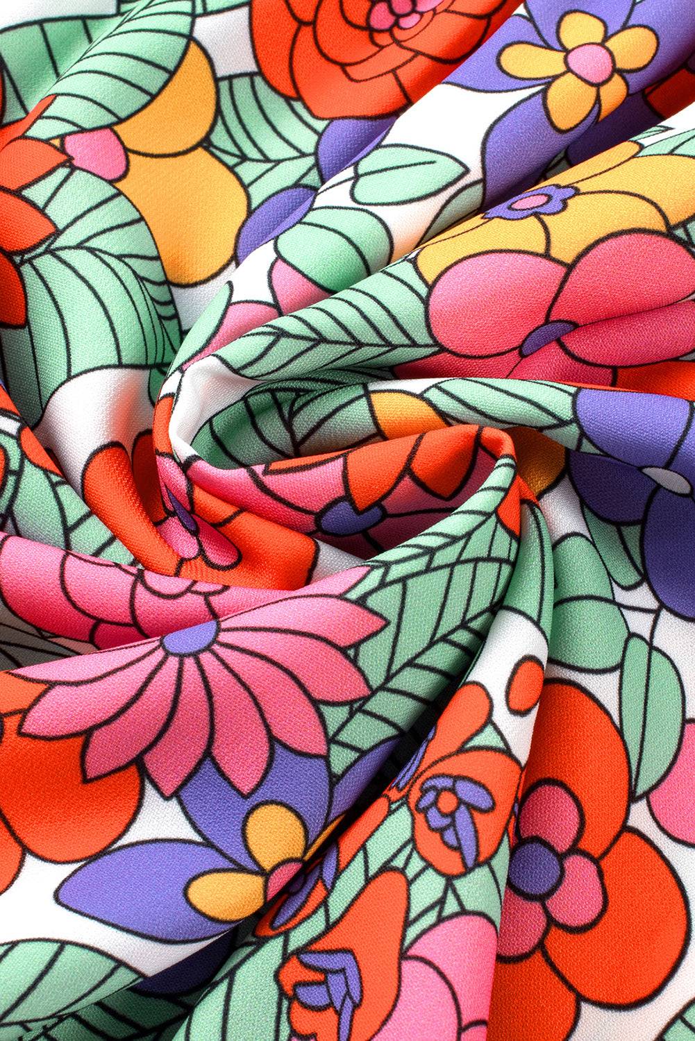 a close up of a colorful flower print fabric