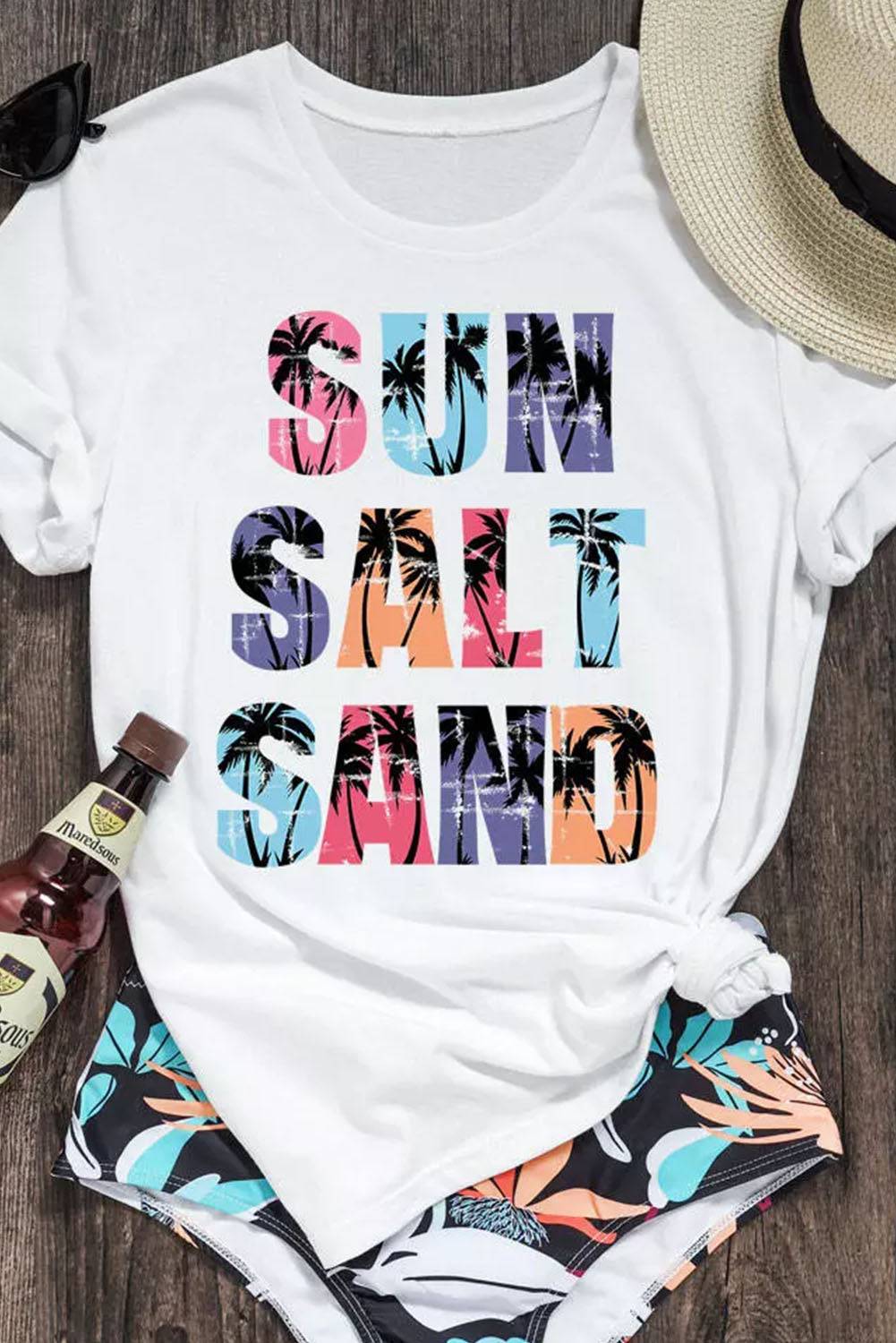 a white shirt that says sun salt sand