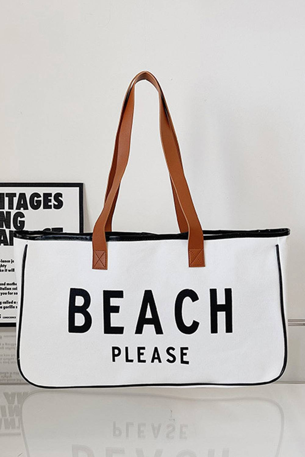 a white beach bag sitting on top of a table