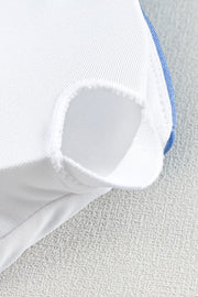 a close up of a white and blue mattress