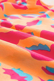 a close up of a colorful fabric with a bat pattern