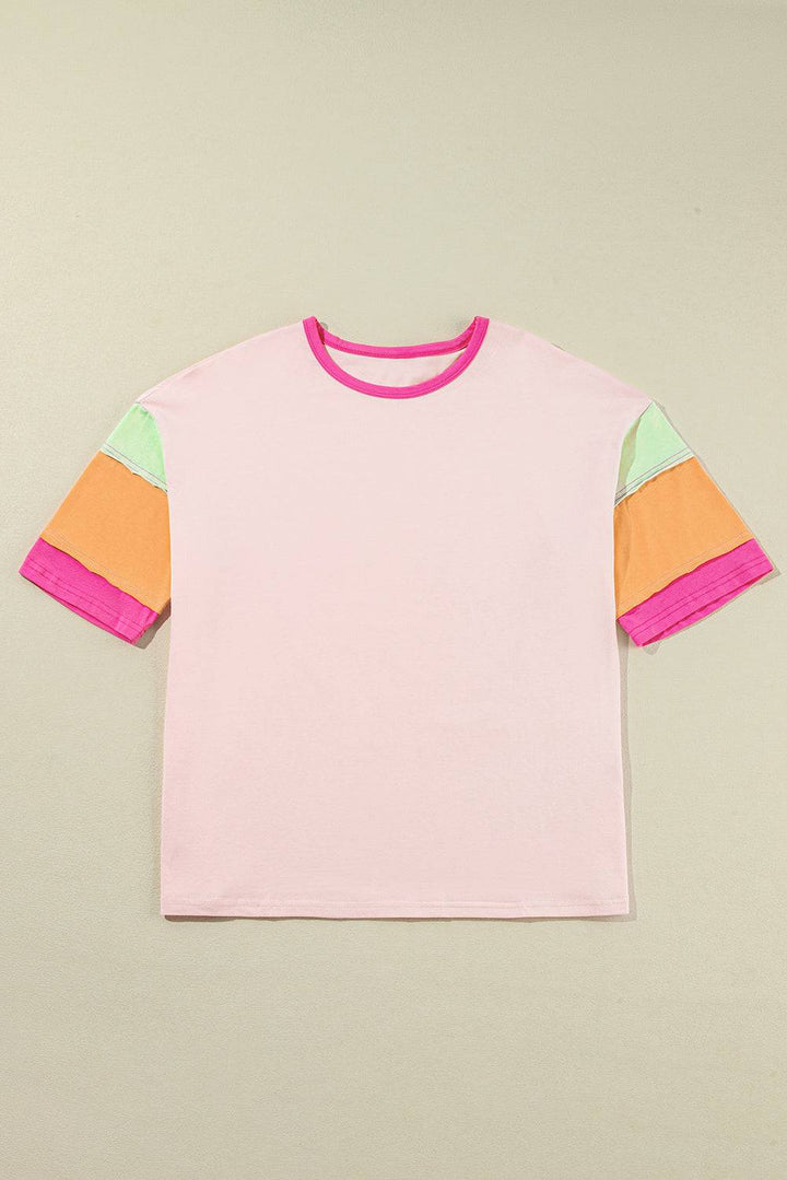 a pink t - shirt with multi - colored sleeves