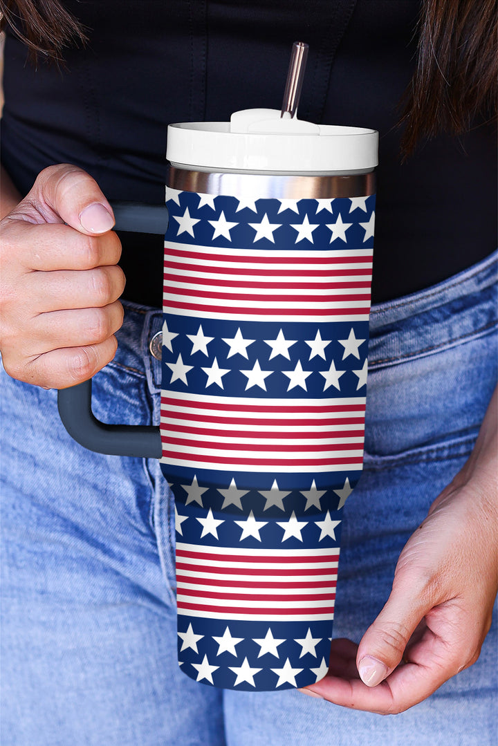 a woman is holding a coffee cup with stars on it
