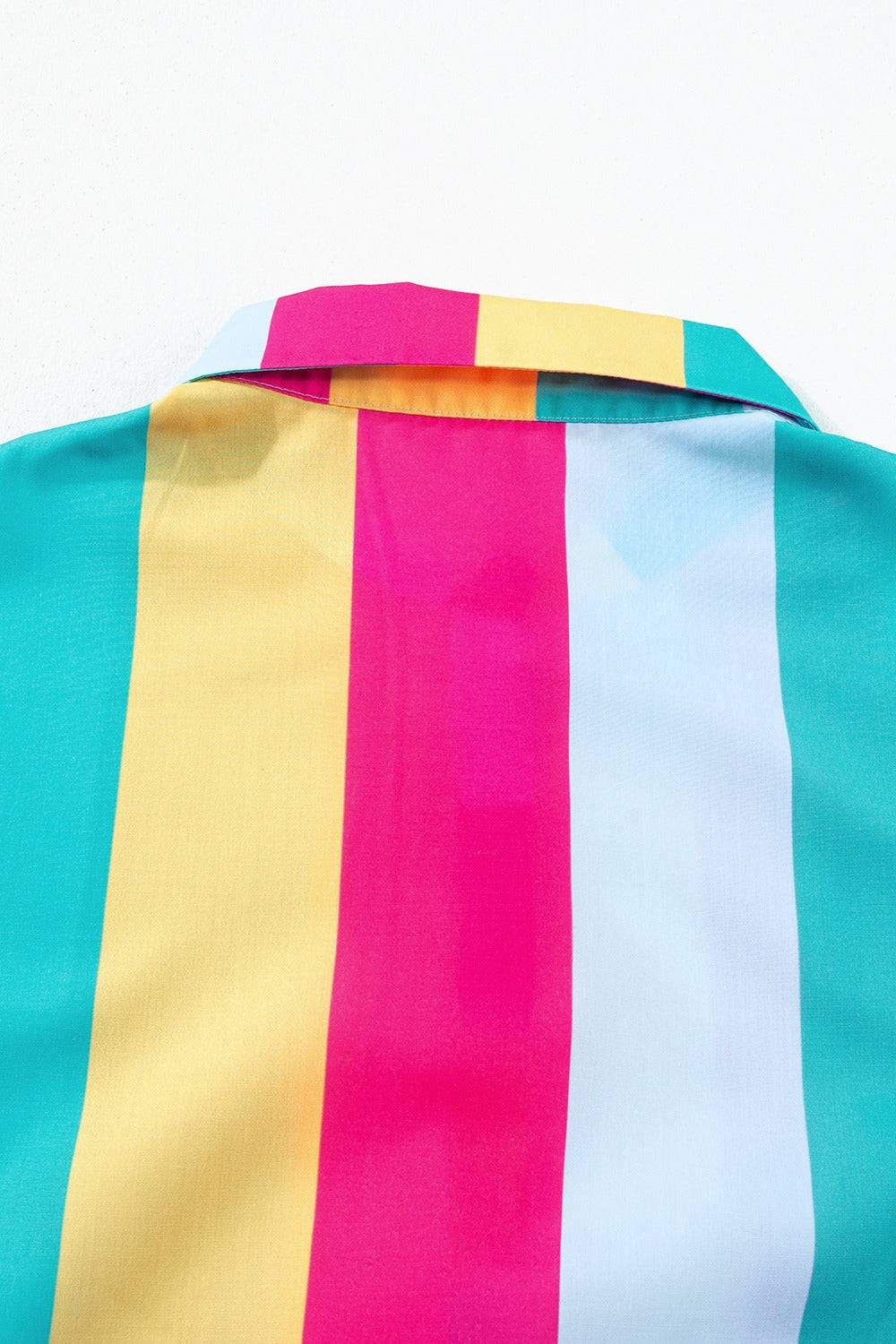 a shirt with a multicolored stripe on it