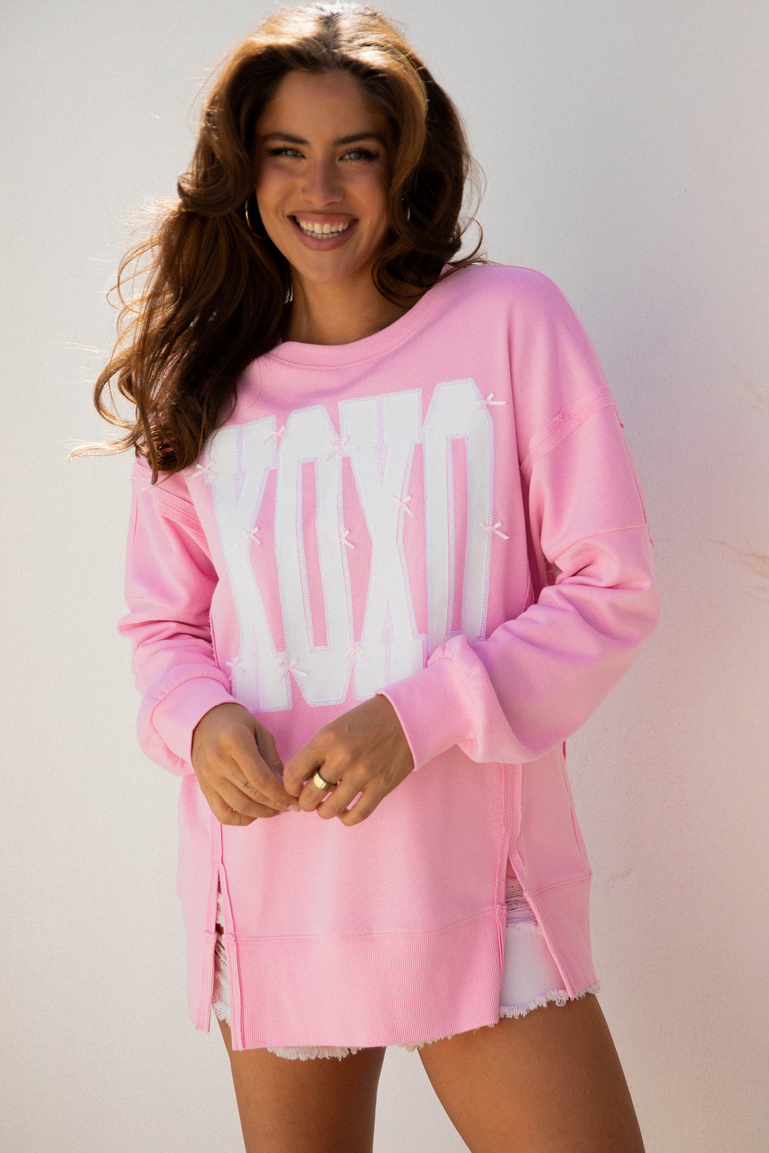 Pink Bow Sequin XOXO Letter Graphic Exposed Seam Baggy Sweatshirt