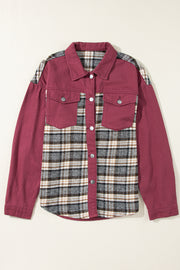 a red jacket with a plaid pattern on it