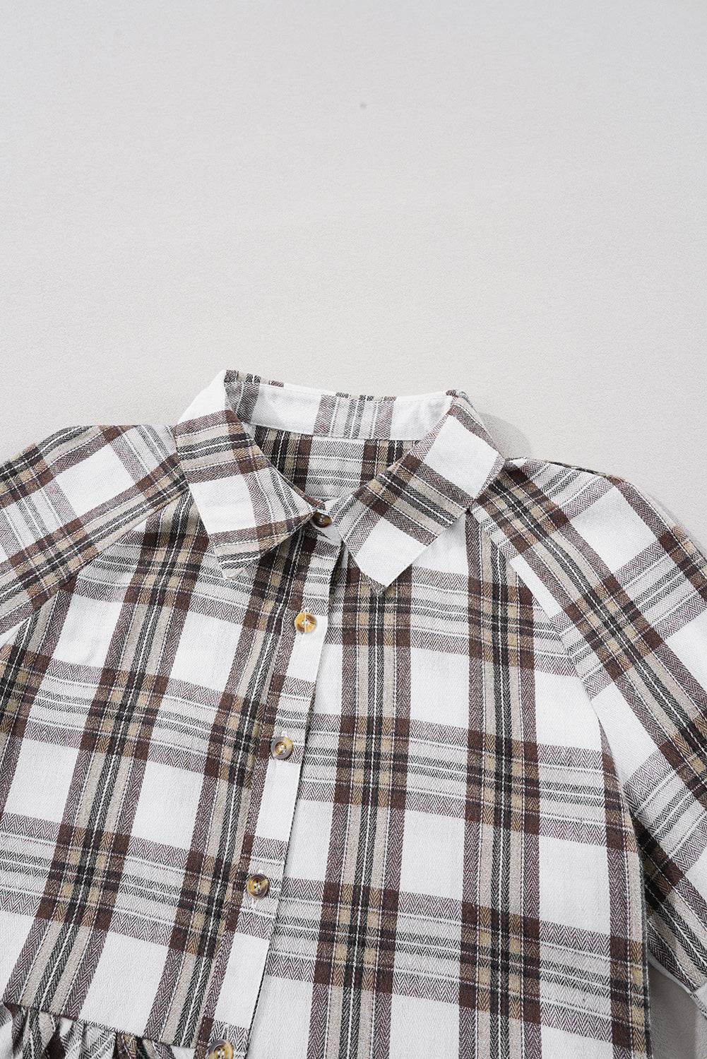 a white shirt with a brown and black checkered pattern