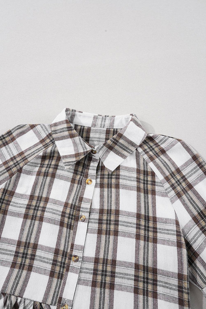 a white shirt with a brown and black checkered pattern