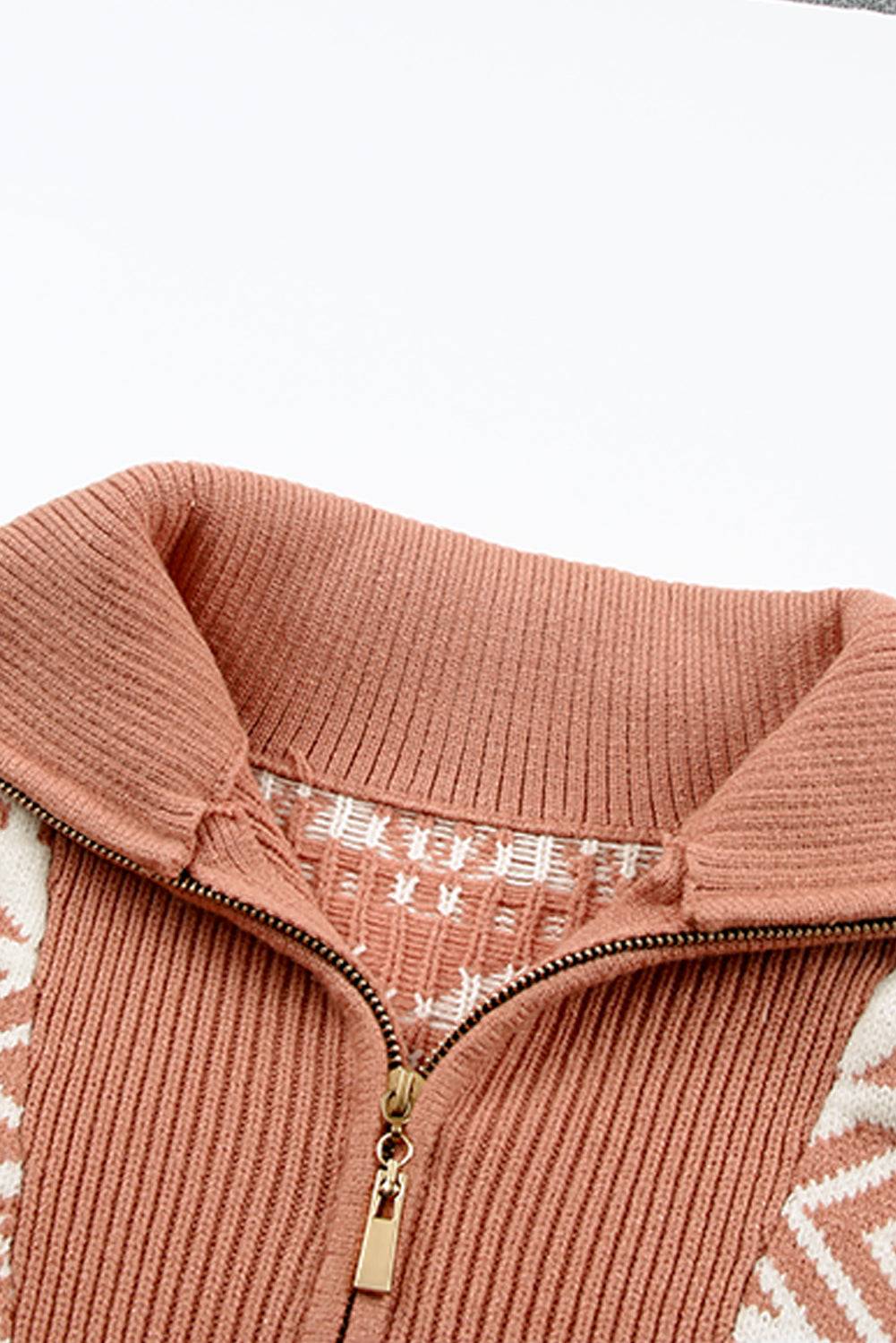 a close up of a sweater with a zipper