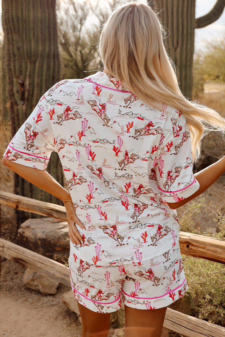 Back view of White Cowgirl Country Print Pajamas Set highlighting colorful cowgirl and cactus pattern. Shop White Cowgirl Country Print Pajamas Set at Faith & Co. Boutique.