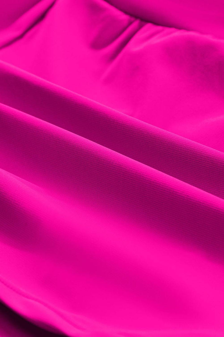 a close up of a bright pink fabric
