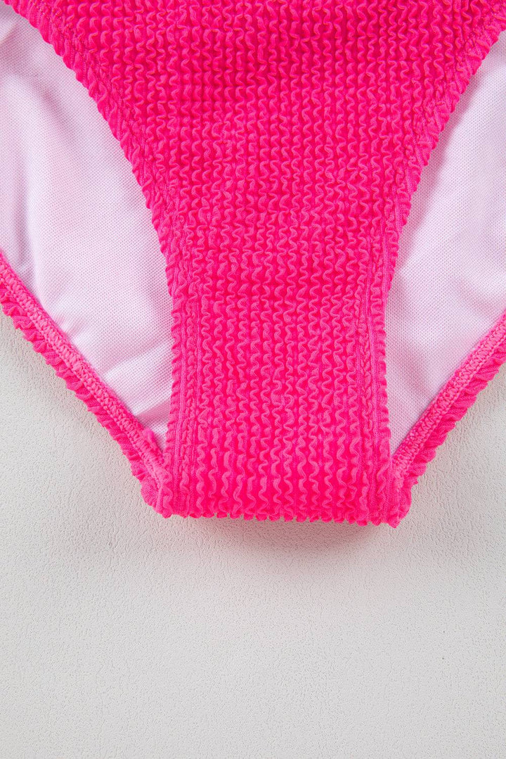 a close up of a pink and white underwear