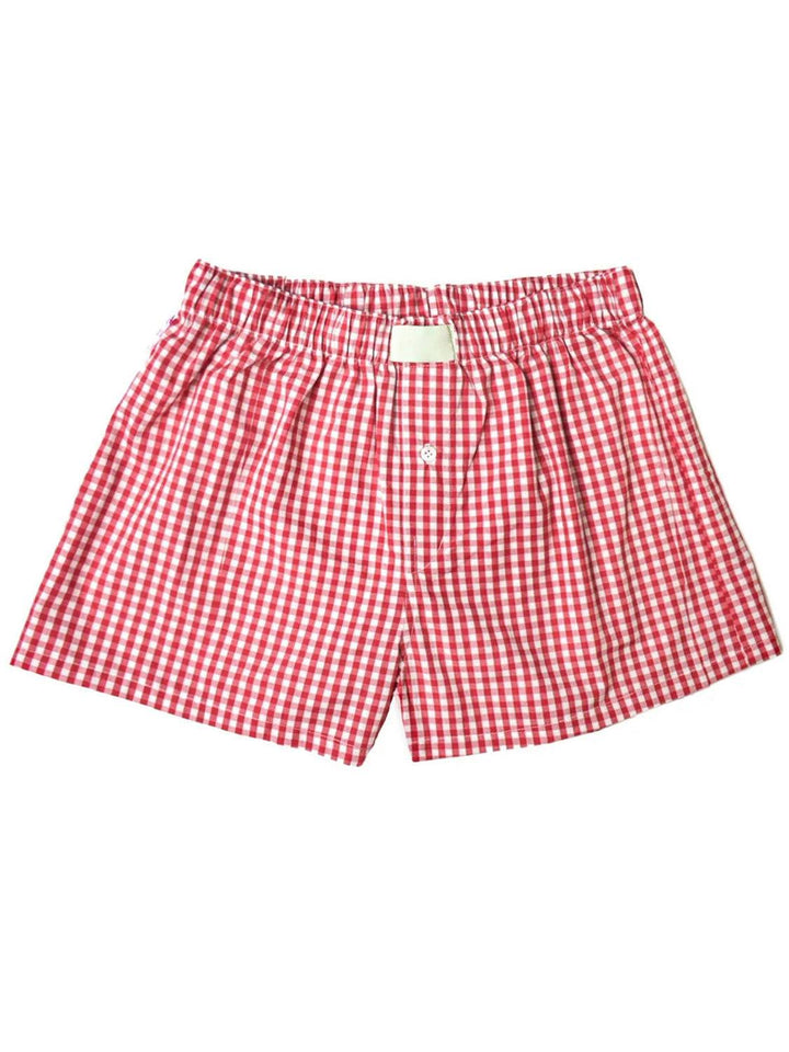a red and white checkered boxers with a white tag