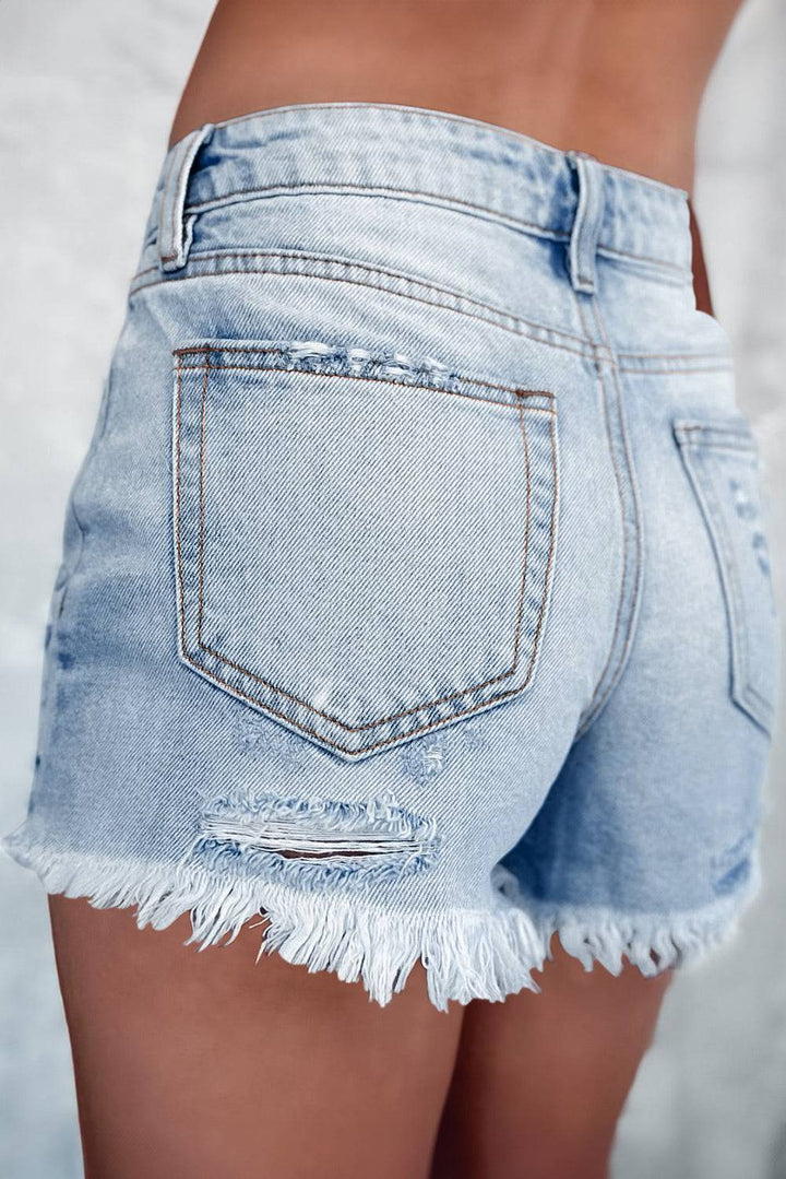 the back of a woman's jean shorts