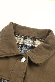 a close up of a shirt with a checkered collar