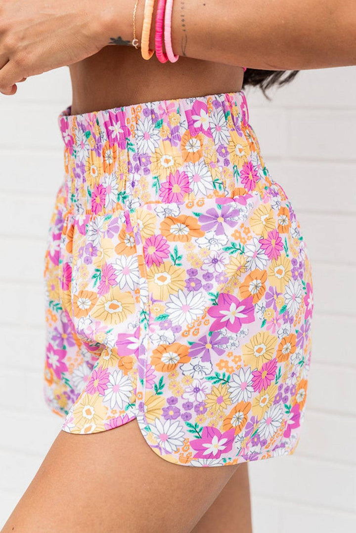 a close up of a person wearing colorful shorts