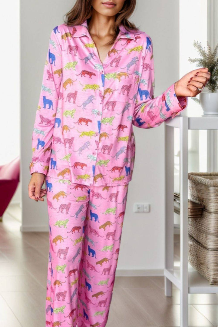 a woman in a pink pajamas stands in a room