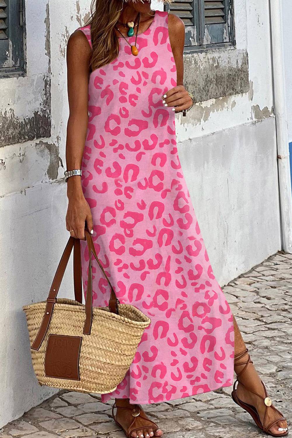 a woman wearing a pink leopard print dress