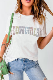 a woman wearing a white t - shirt with the words cowgirls on it