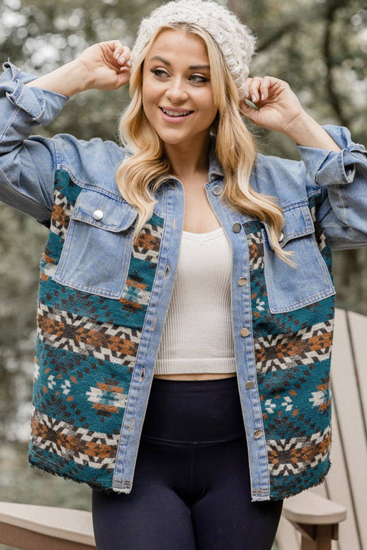 a woman wearing a denim jacket and a knitted hat