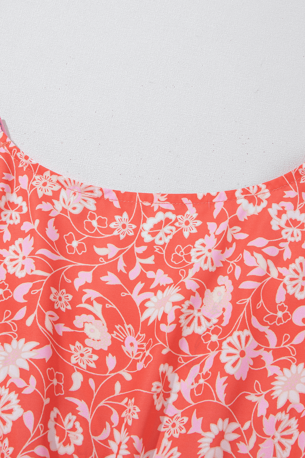 upper back fabric detail of Red Floral Print Tasseled Tied Sleeve Empire Waist Maxi Dress, showcasing vibrant floral pattern