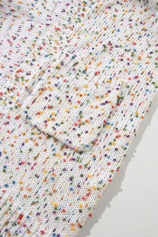 a close up of a white shirt with multicolored dots