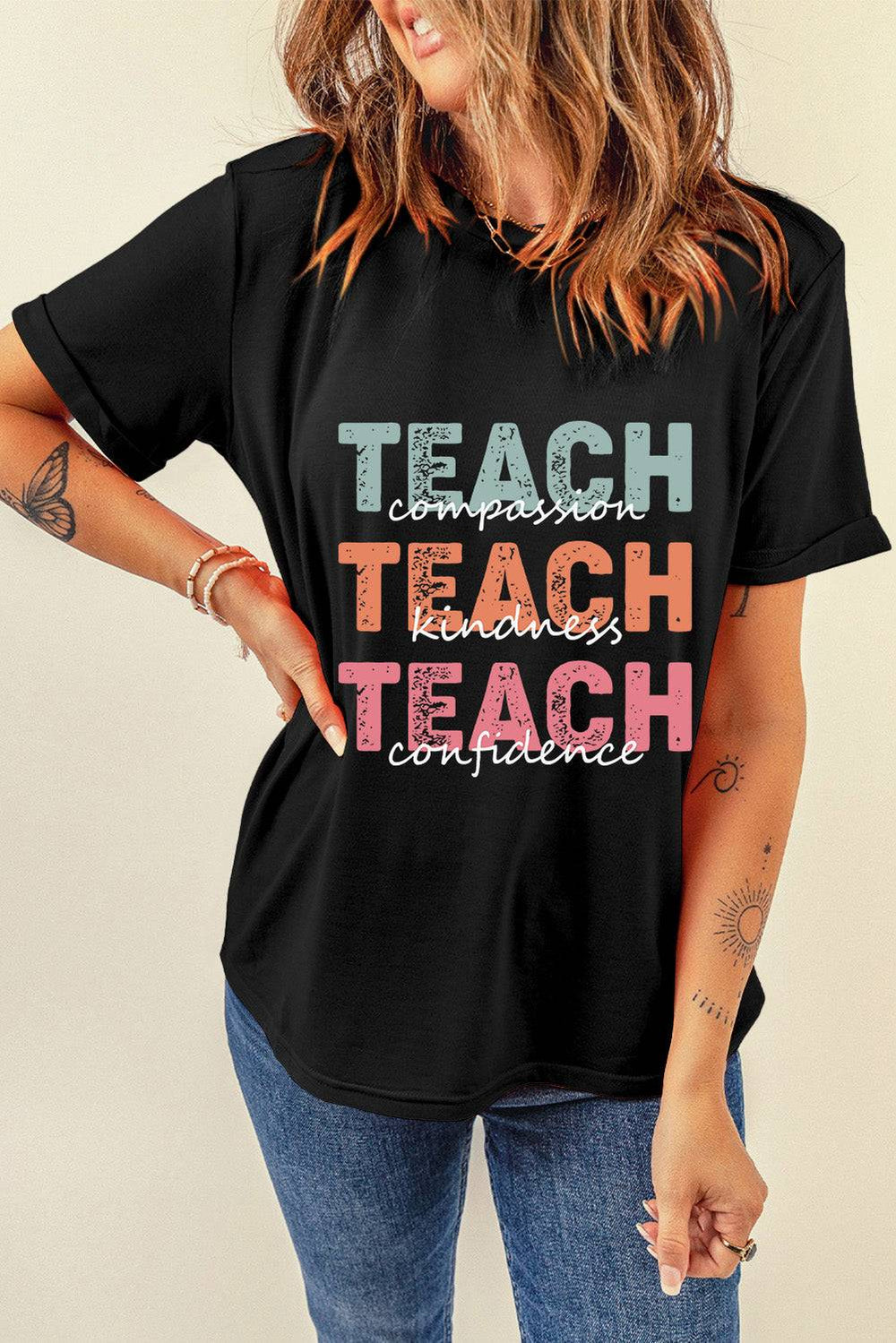 a woman wearing a black teach t - shirt