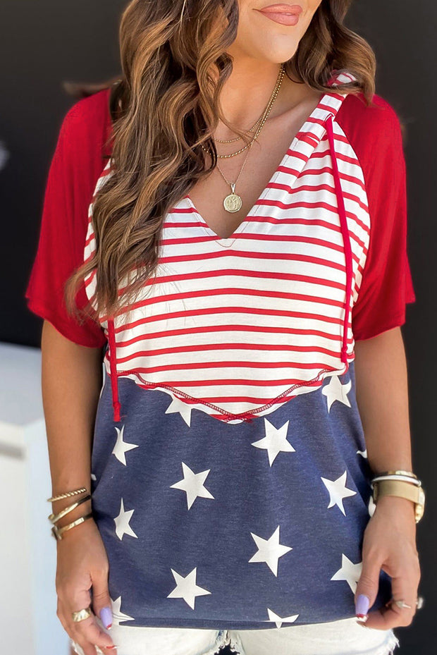 a woman wearing a red, white and blue shirt
