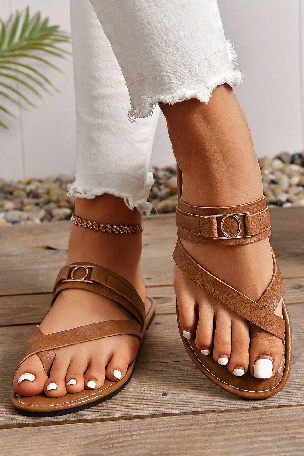 a close up of a person wearing sandals