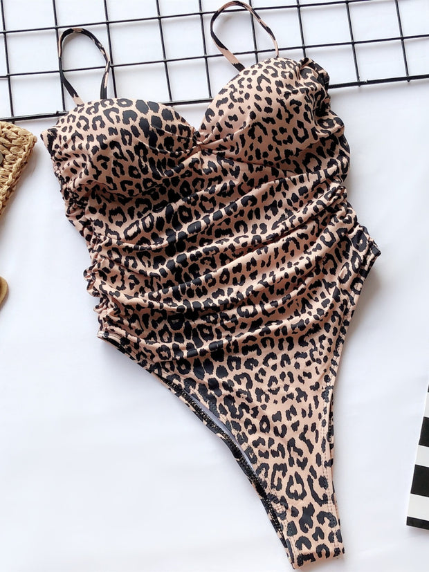 a bikini top with a leopard print on it