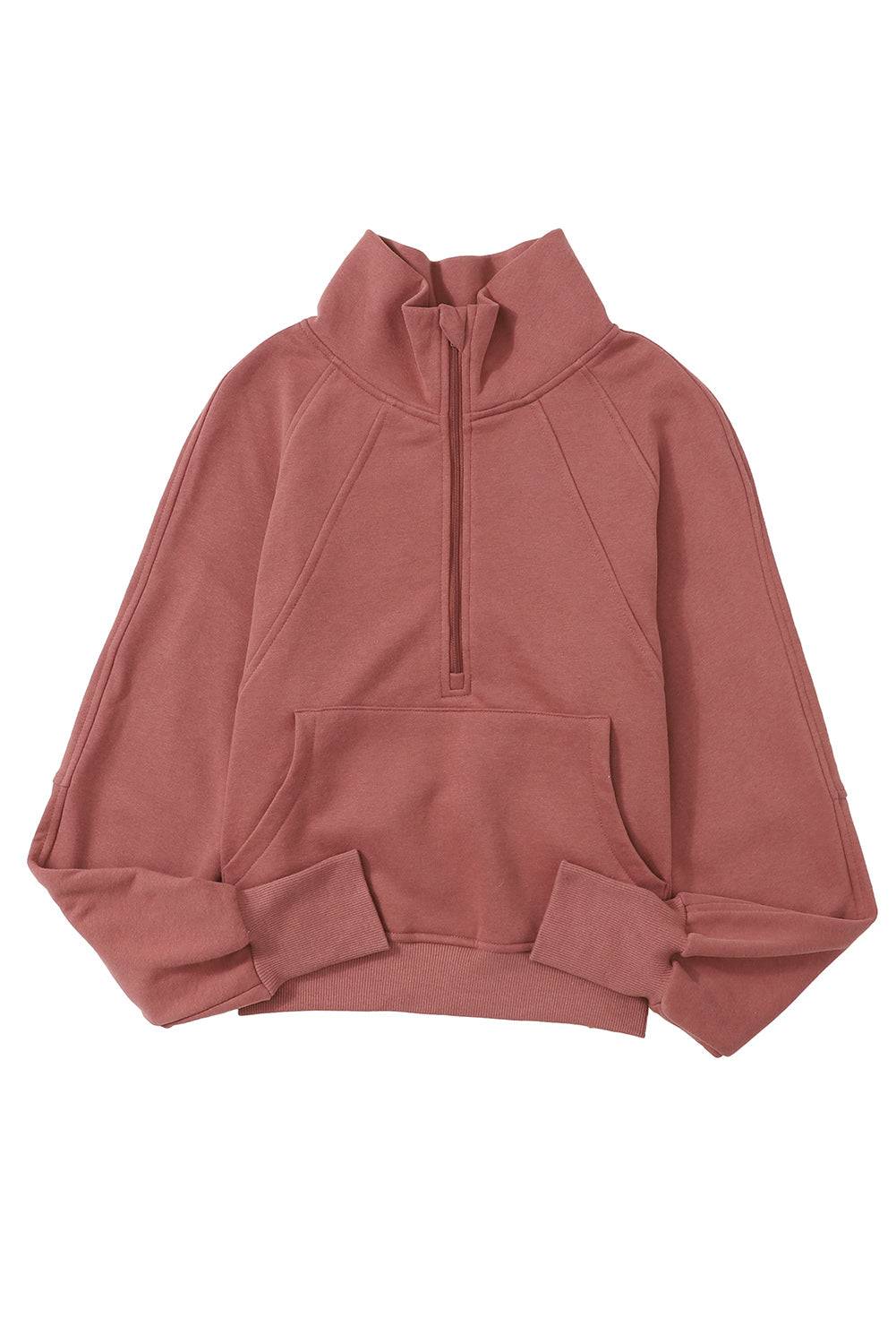 a pink sweatshirt with a hoodie on top of it