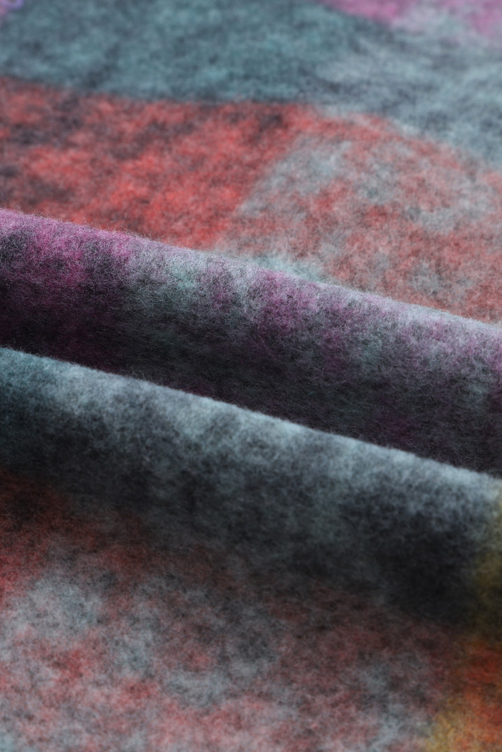 a close up of a blanket with a tie on it