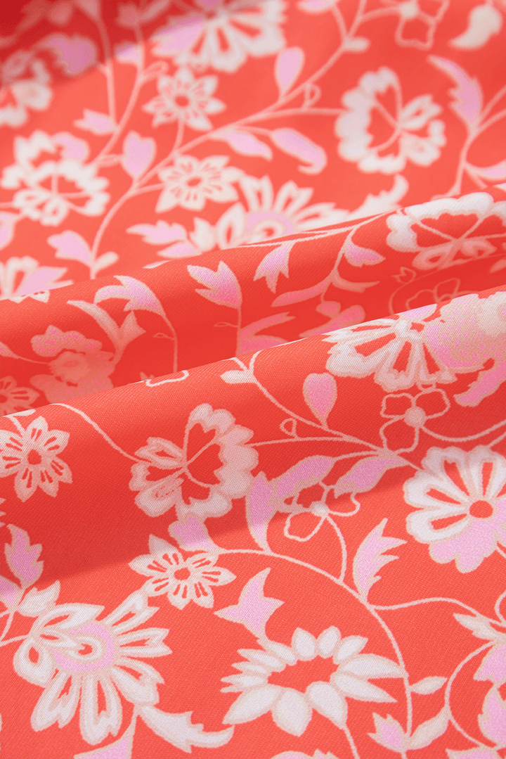 fabric close-up of Red Floral Print Tasseled Tied Sleeve Empire Waist Maxi Dress, featuring soft red floral print for summer comfort