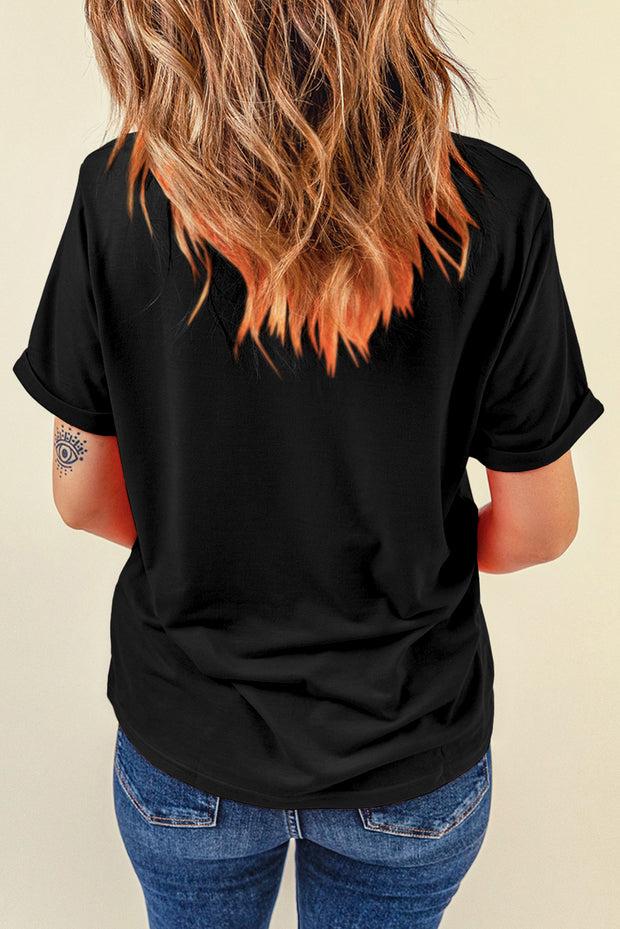the back of a woman wearing a black shirt