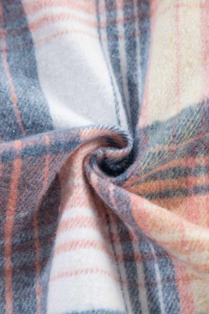 a close up of a plaid fabric