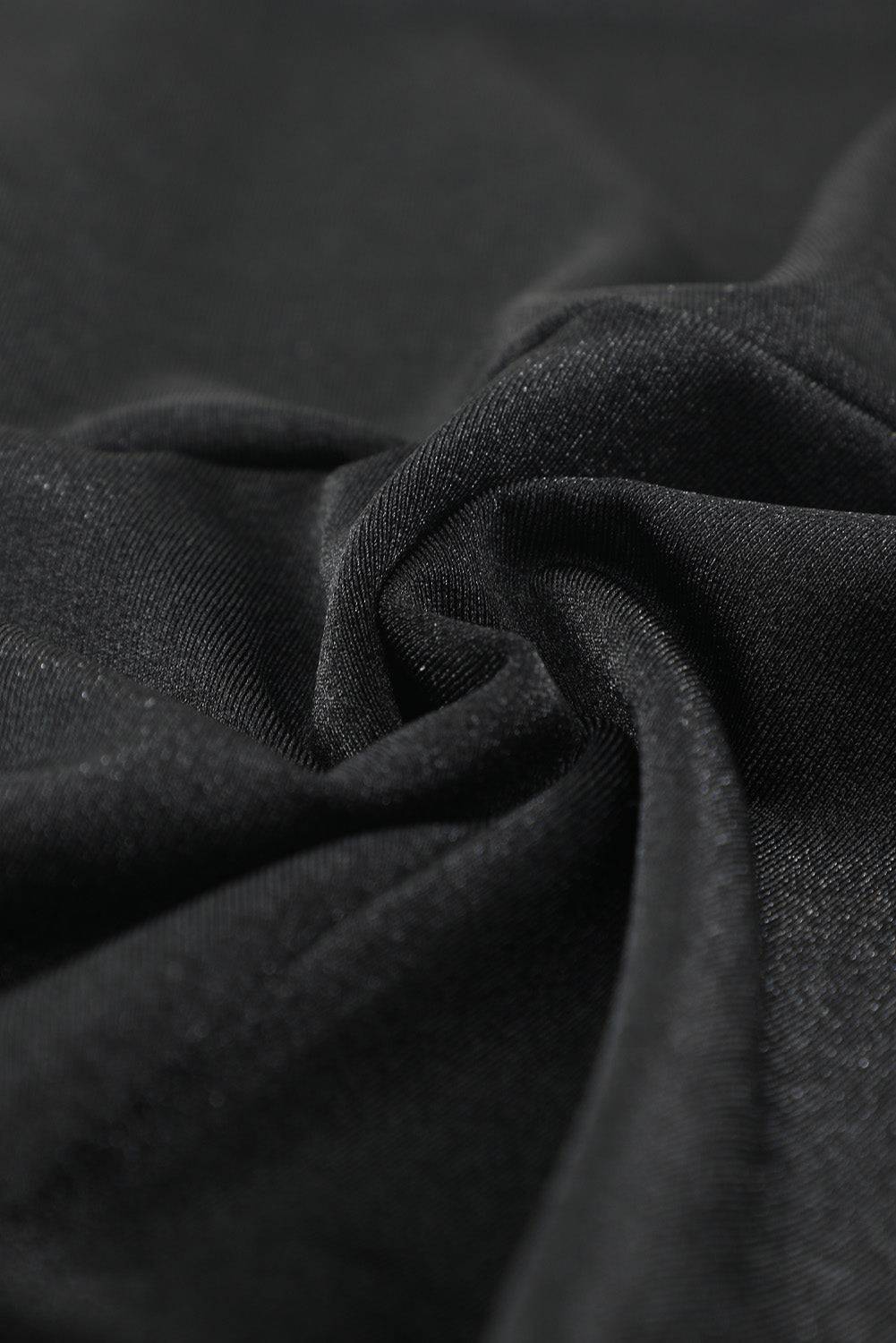 a close up view of a black fabric