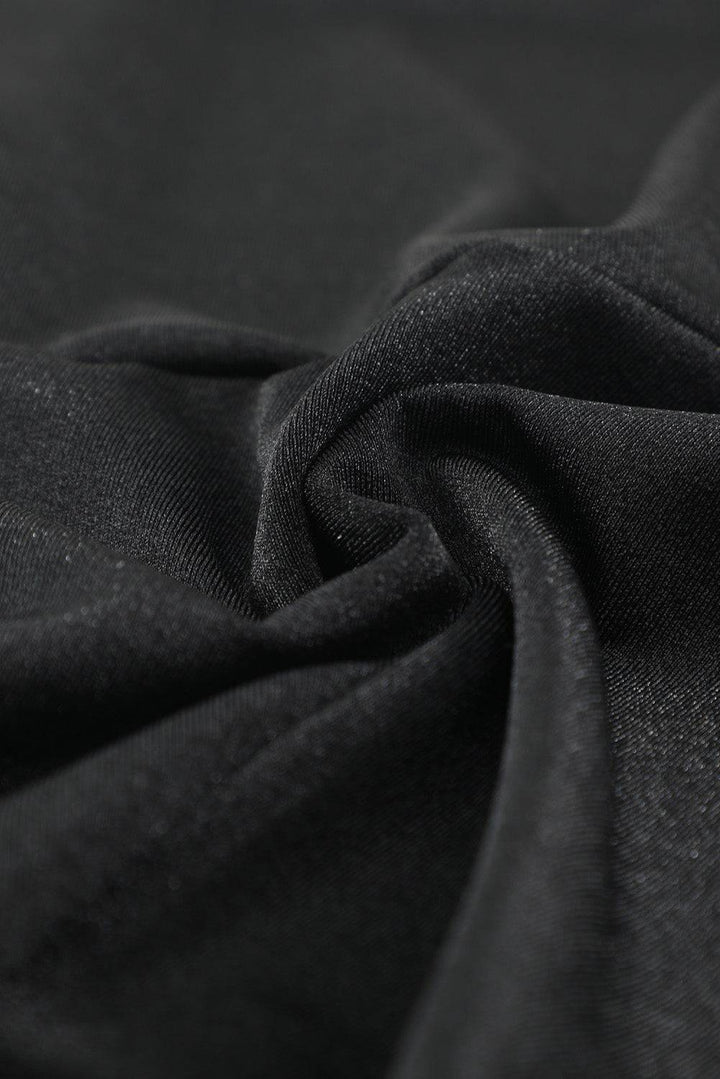 a close up view of a black fabric