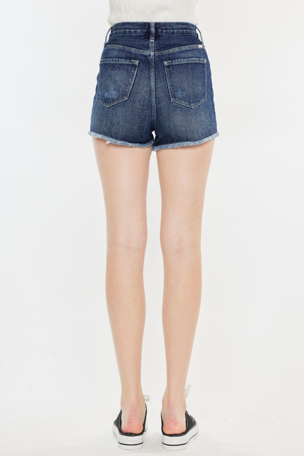 the back of a woman's jean shorts
