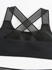 a black sports bra top with straps
