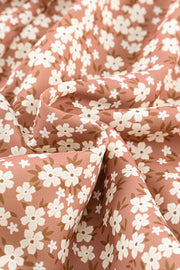 a close up of a flower print fabric