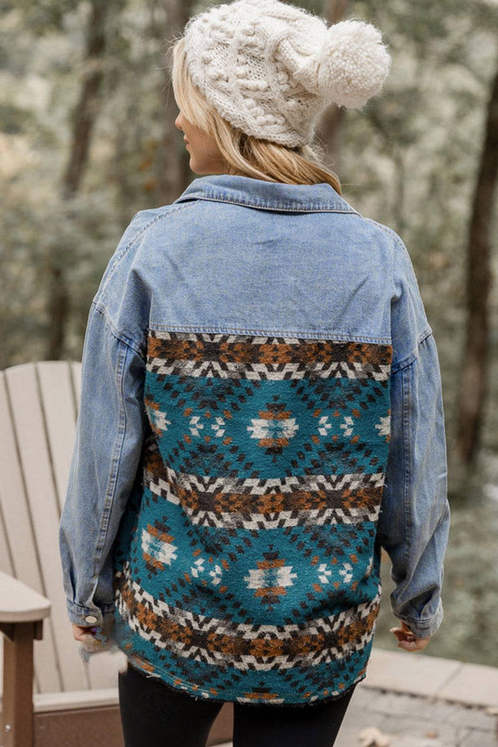 a woman wearing a jean jacket and a white hat